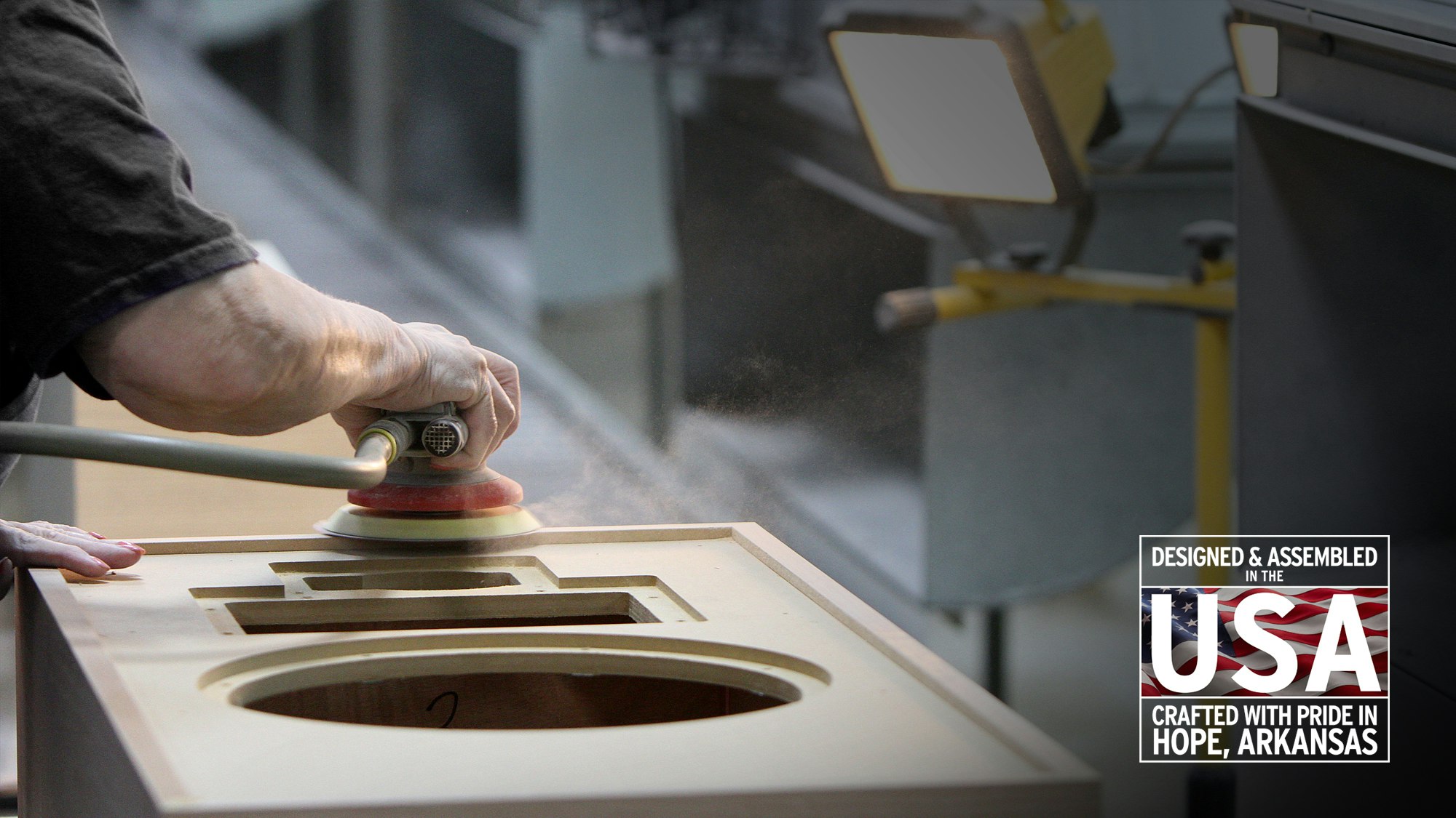 A craftsman in the Klipsch factory sands the cabinet of a Forte speaker. Proudly Designed and Assembled in the USA. Crafted with pride in Hope, Arkansas.